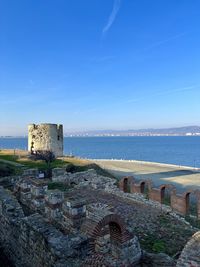 Scenic view of sea against blue sky