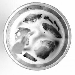Close-up of apple over white background
