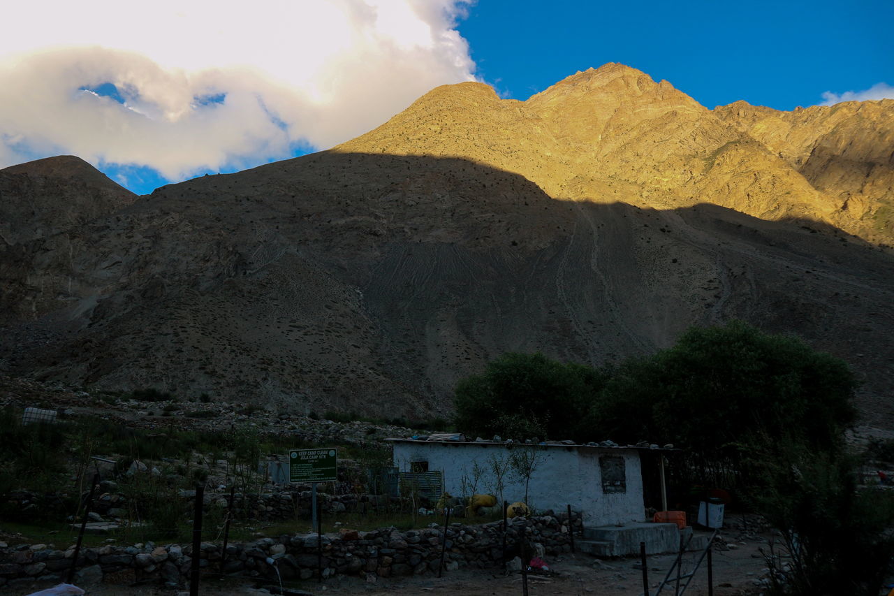 PANORAMIC VIEW OF RESIDENTIAL DISTRICT AGAINST SKY