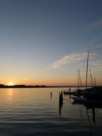 Scenic view of sea at sunset