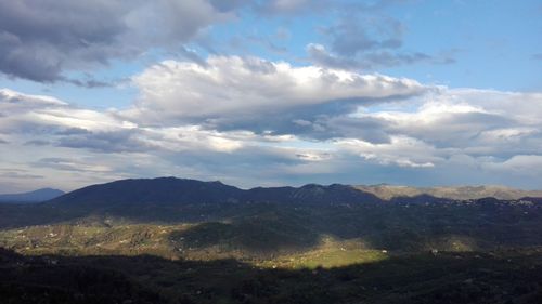 Scenic view of mountains against sky during sunset
