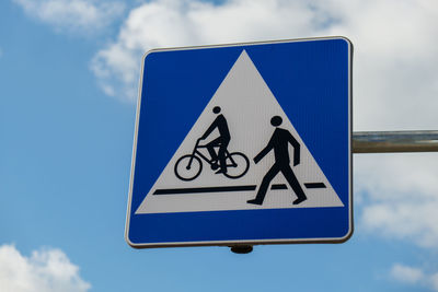 Cyclist and pedestrian route sharing sign. road sign pedestrian and bicycle can cross the street