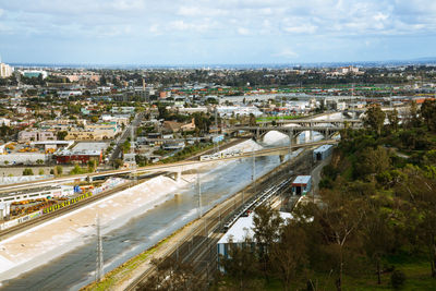 High angle view of road amidst buildings in city