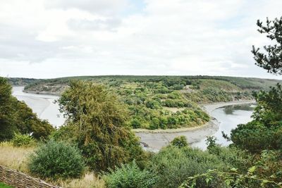 High angle view of calm lake against cloudy sky