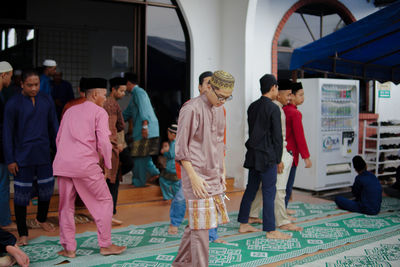 People standing in corridor