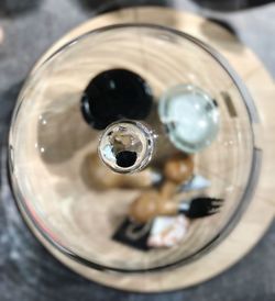 Close-up of wine glasses on table