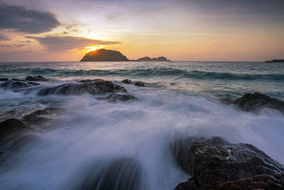 Scenic view of sea against sky during sunset