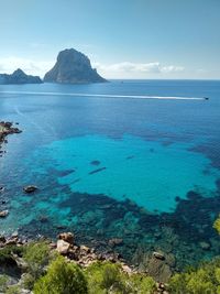 Beautiful panorama of the islet of es vedra on the cliff of cala d'hort in ibiza, pitiusa island 