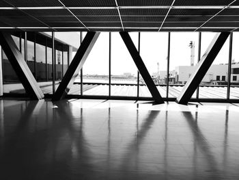 Bridge against sky seen through glass