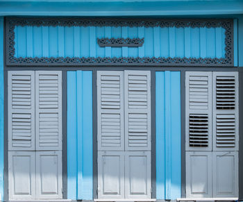 Closed blue window of building