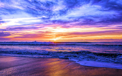 Scenic view of sea against sky during sunset