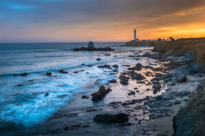 Scenic view of sea against sky during sunset