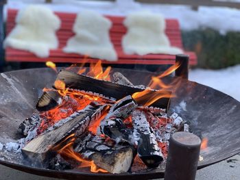 Close-up of firewood on barbecue grill