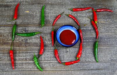 High angle view of red chili pepper on table