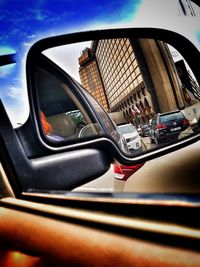 Close-up of vintage car on side-view mirror