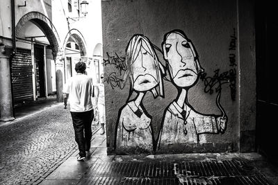 Close-up of woman against wall