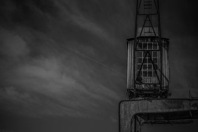 Low angle view of old tower against sky