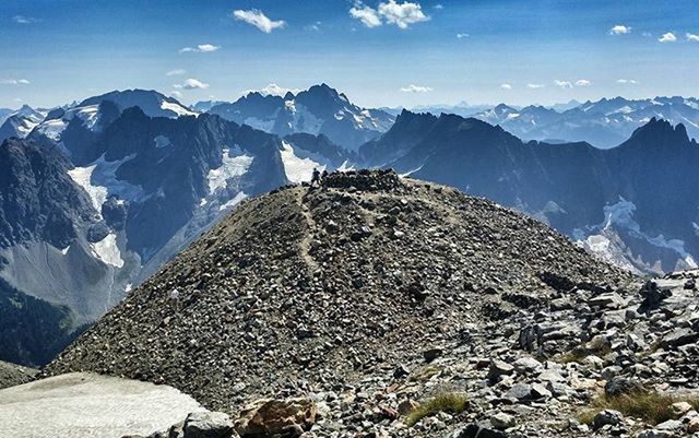 mountain, mountain range, tranquil scene, tranquility, scenics, beauty in nature, snow, sky, landscape, nature, physical geography, snowcapped mountain, cold temperature, winter, rock - object, non-urban scene, geology, rock formation, rocky mountains, majestic