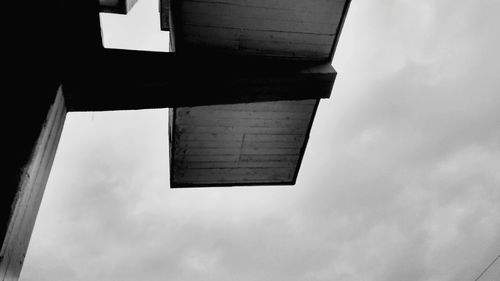 High section of built structure against clouds