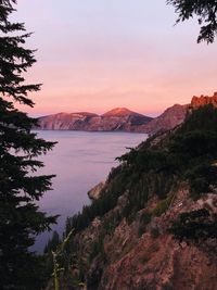 Scenic view of sea against sky at sunset