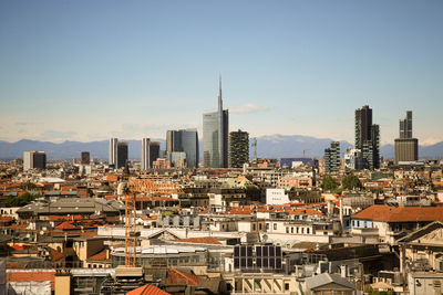 High angle shot of townscape against clear blue sky