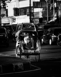 This traditional transportation in indonesia is called becak.