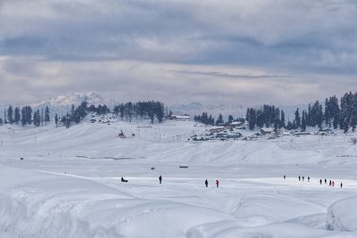 Scenic view of snow covered mountain against sky