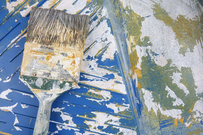 Close-up of blue painted over white background