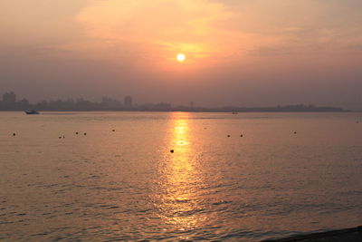 Scenic view of sea against sky during sunset