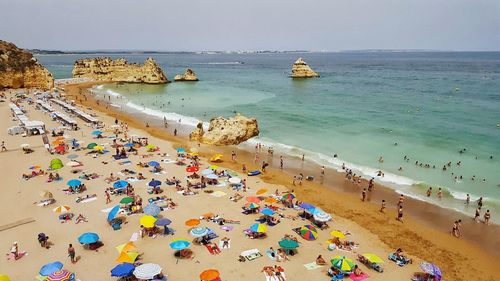 People enjoying at beach