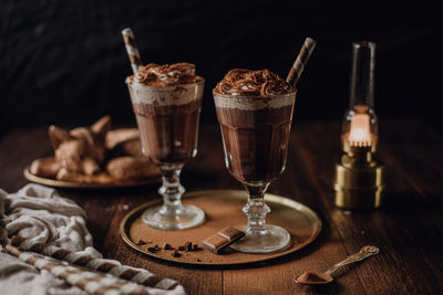 Warm chocolate and coffee beverage / drink - dark and moody vintage food photography