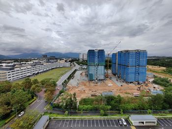 Buildings in city against sky