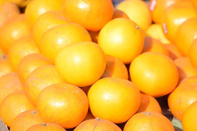 Full frame shot of oranges in market