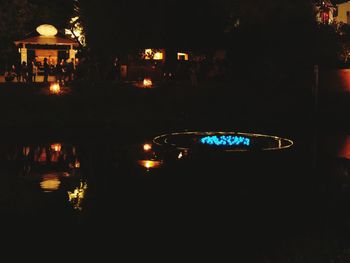 Illuminated street light at night