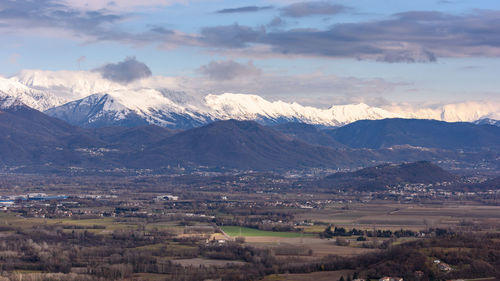 Scenic view of snowcapped mountains against sky