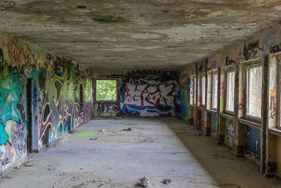 Graffiti on wall in abandoned building