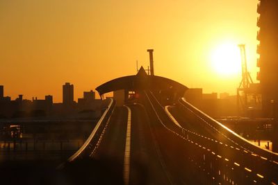 Panoramic view of city against clear sky during sunset