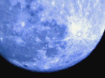 Low angle view of moon against sky