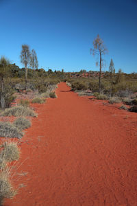 View of landscape against clear blue sky