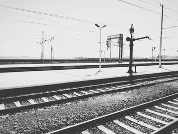 Railroad tracks against clear sky