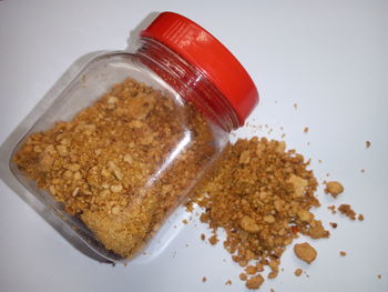 Close-up of cake in jar on table