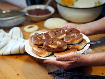 The process of home cooking whites, small pies with natural meat and the addition of vegetables.