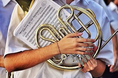 Close-up of hand holding guitar