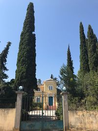 Low angle view of built structure against clear blue sky