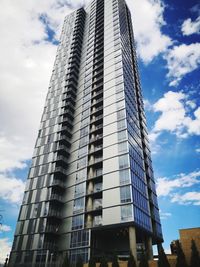 Low angle view of modern buildings against sky