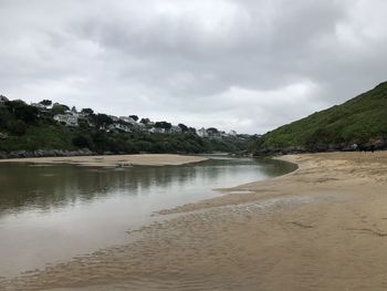 Scenic view of beach against sky