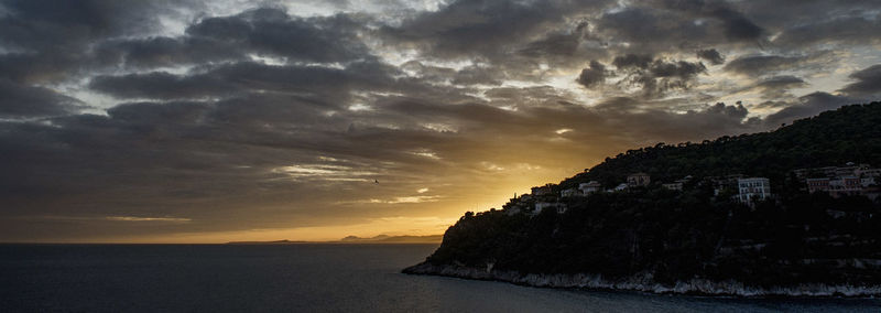 Scenic view of sea against sky at sunset