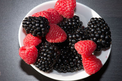 Close-up of strawberries in plate on table