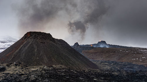 Panoramic view of volcanic mountain against sky