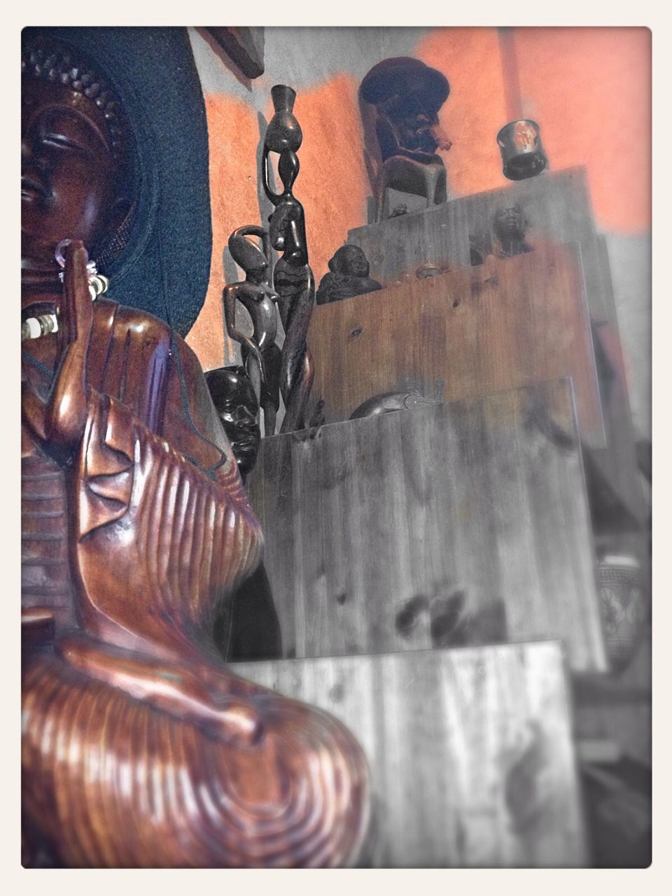 transfer print, auto post production filter, indoors, close-up, art and craft, still life, wood - material, art, old-fashioned, table, no people, animal representation, ornate, part of, creativity, metal, antique, old, human representation, focus on foreground